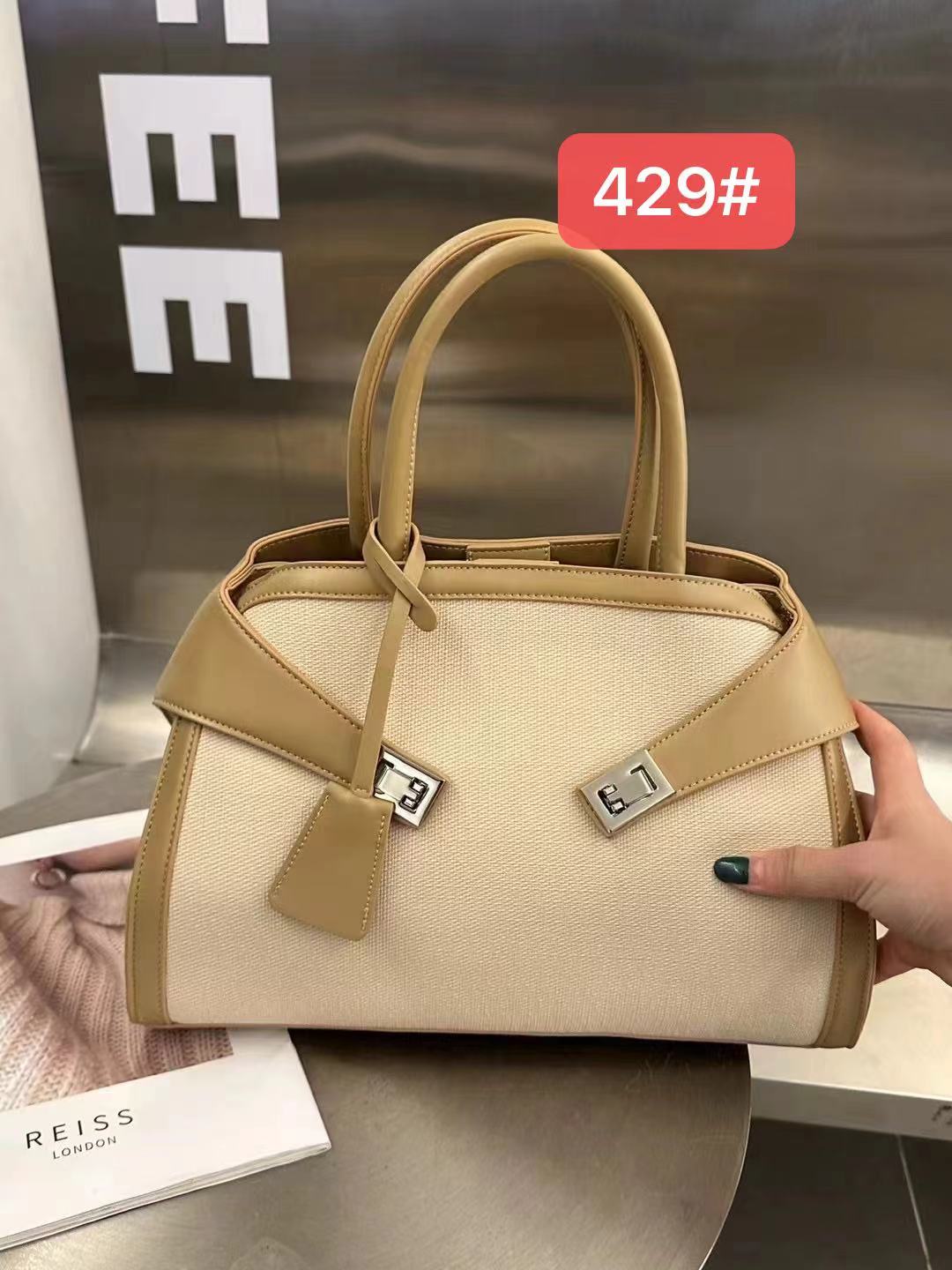 حقيبة كتف نسائية ثنائية اللون بمقبض علوي