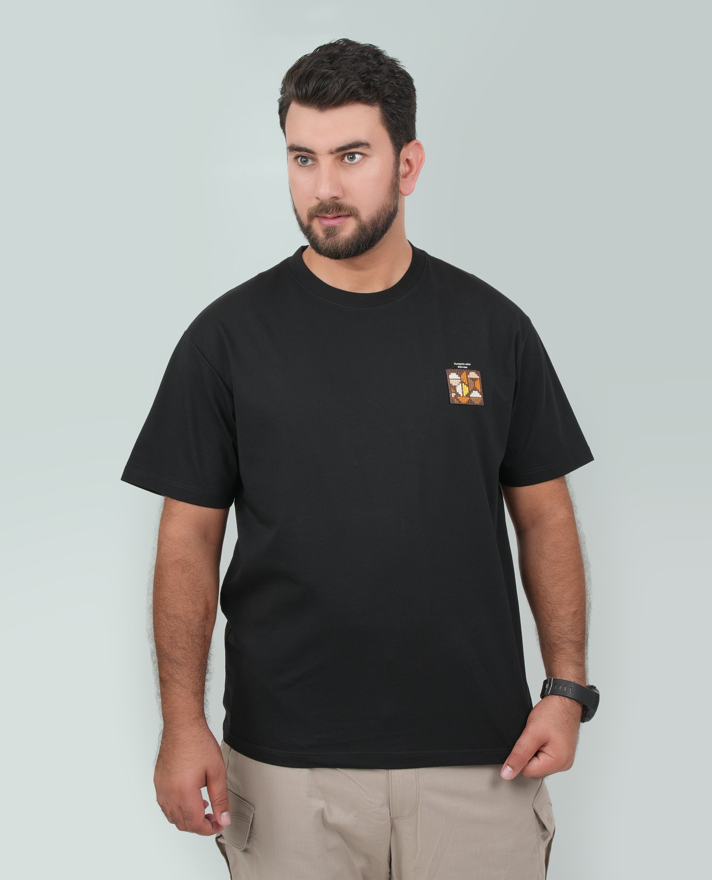 Men’s Solid T-Shirt – Cross-Stitch Pattern with Minimal Front & Back Text.