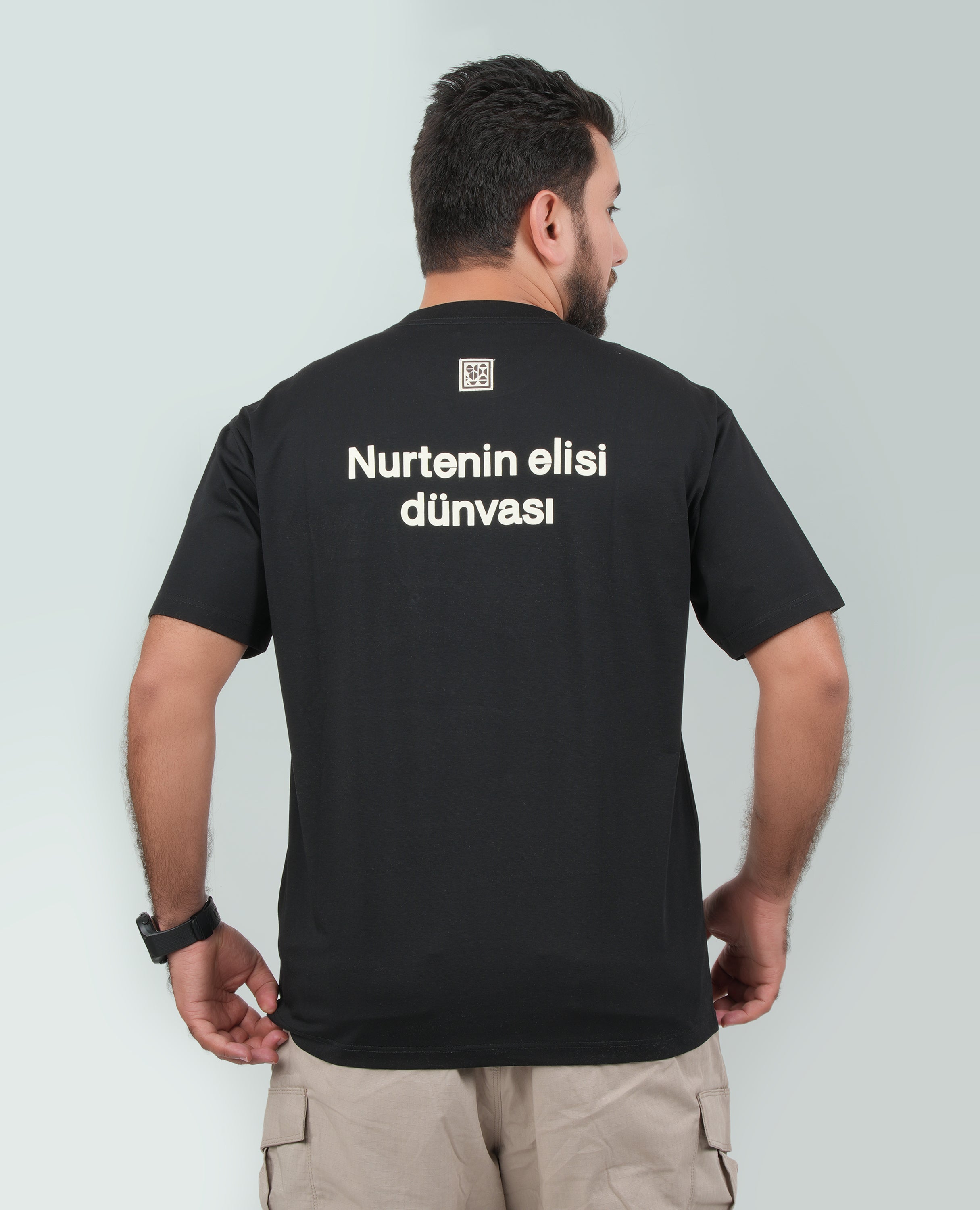 Men’s Solid T-Shirt – Cross-Stitch Pattern with Minimal Front & Back Text.