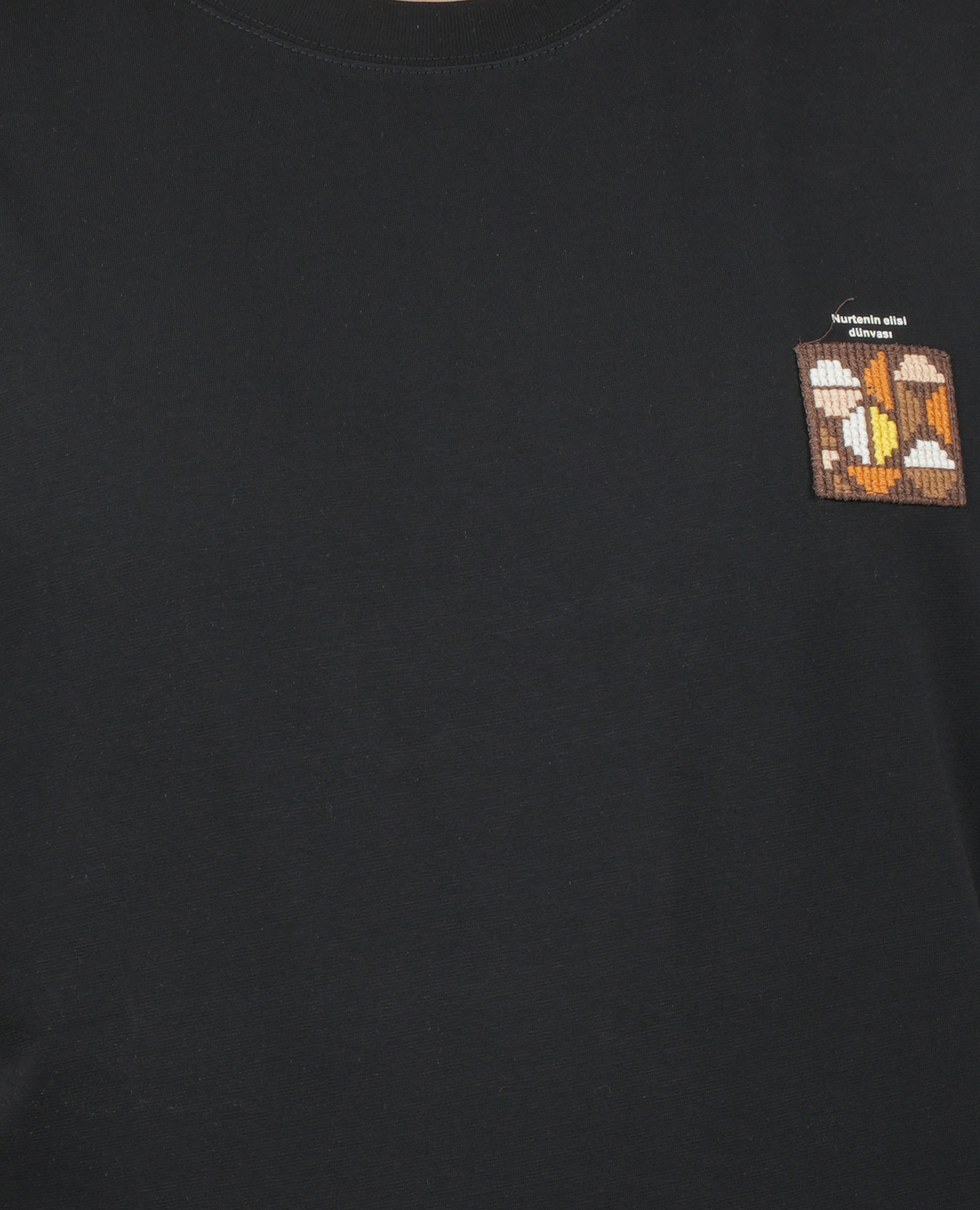 Men’s Solid T-Shirt – Cross-Stitch Pattern with Minimal Front & Back Text.