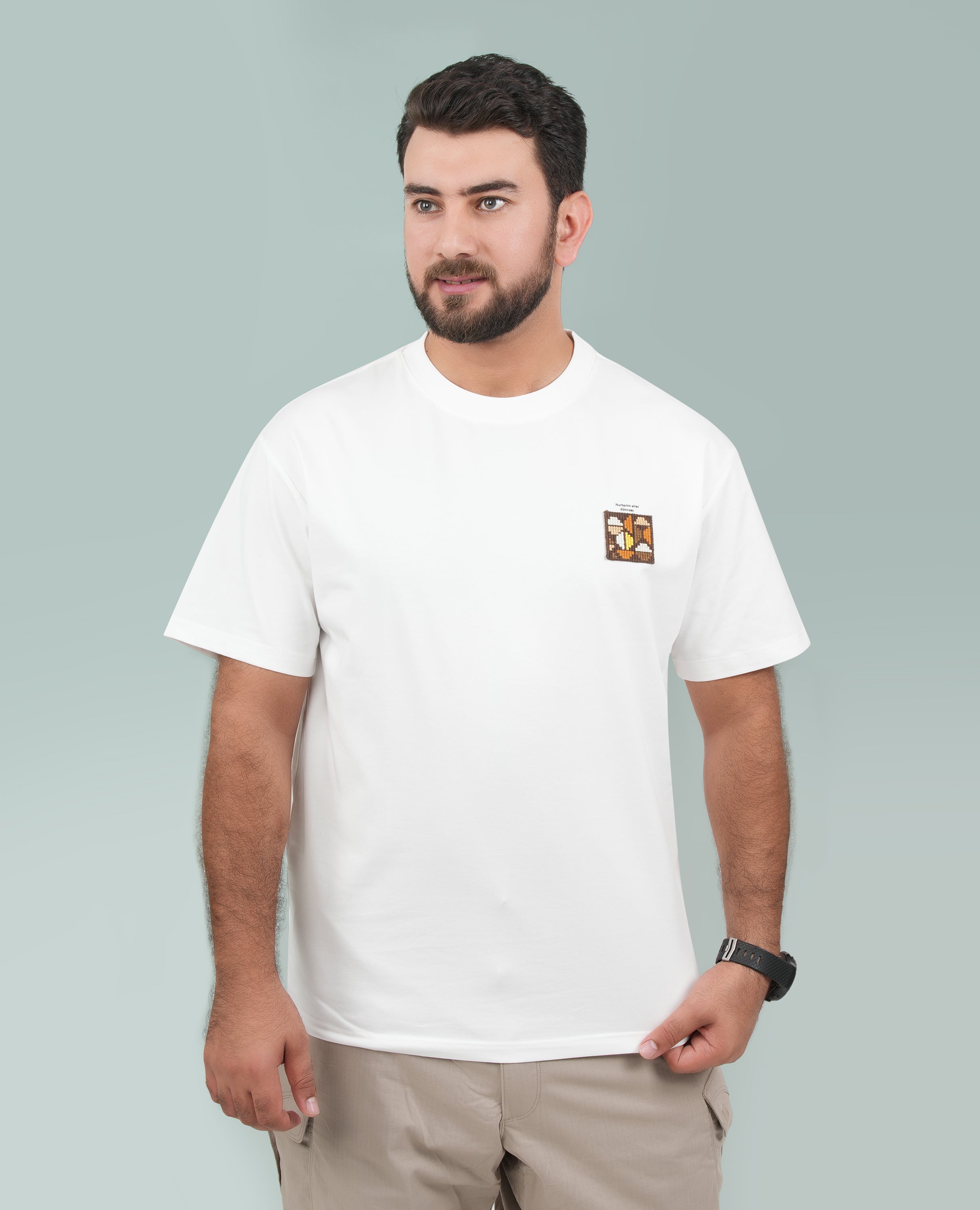 Men’s Solid T-Shirt – Cross-Stitch Pattern with Minimal Front & Back Text.