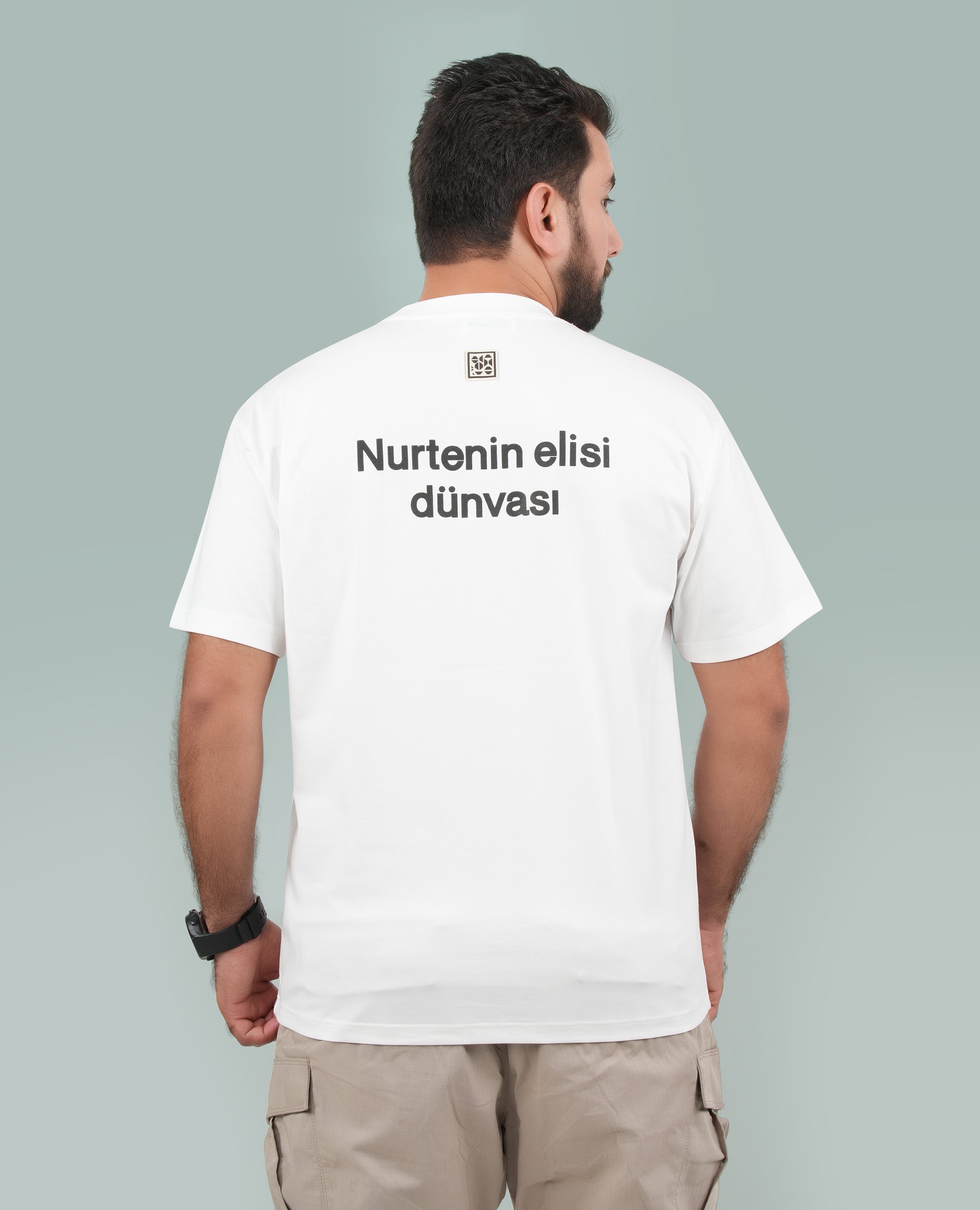 Men’s Solid T-Shirt – Cross-Stitch Pattern with Minimal Front & Back Text.