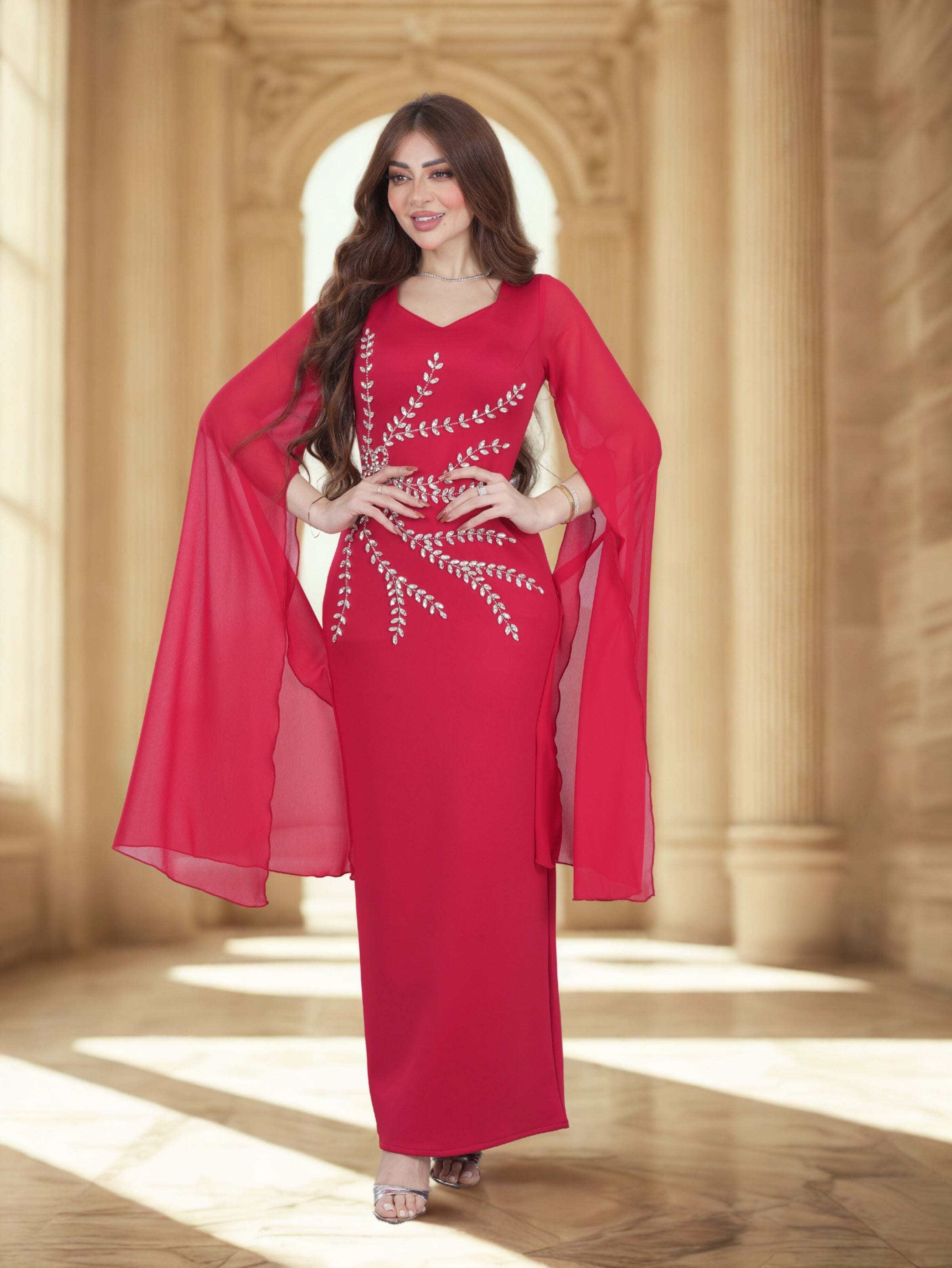 Luxury Embellished Red Gown with Flowing Cape Sleeves