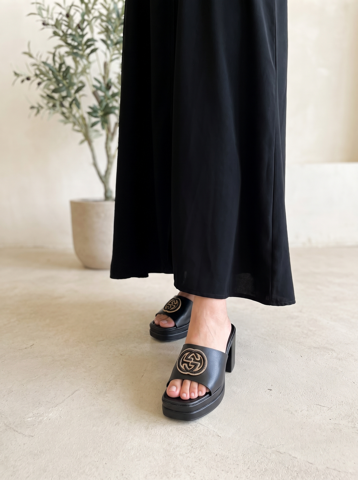 Women’s Black Platform Heeled Mules – Chic Open-Toe Slides with Embellished Logo Accent
